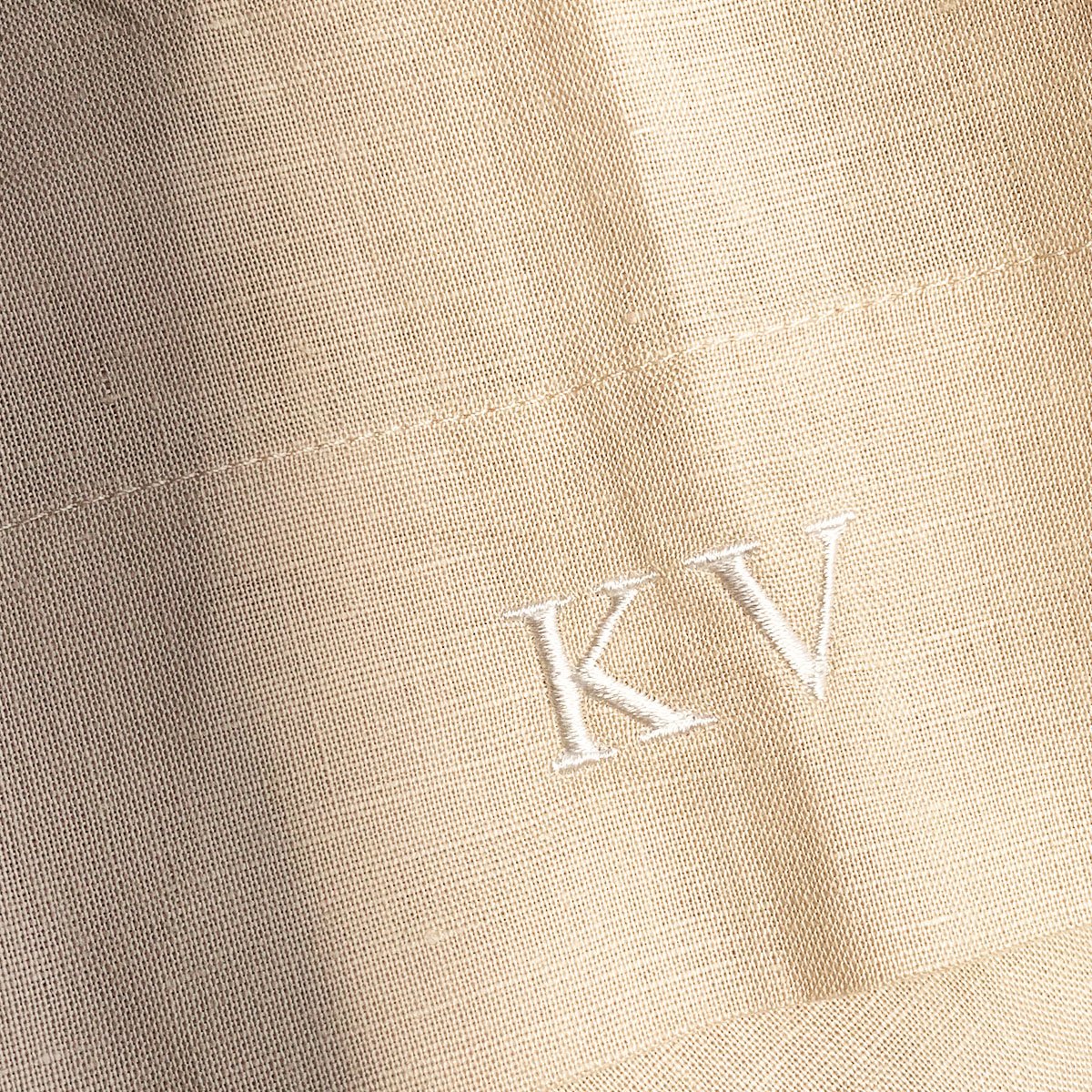 Embroidered initials on robe
