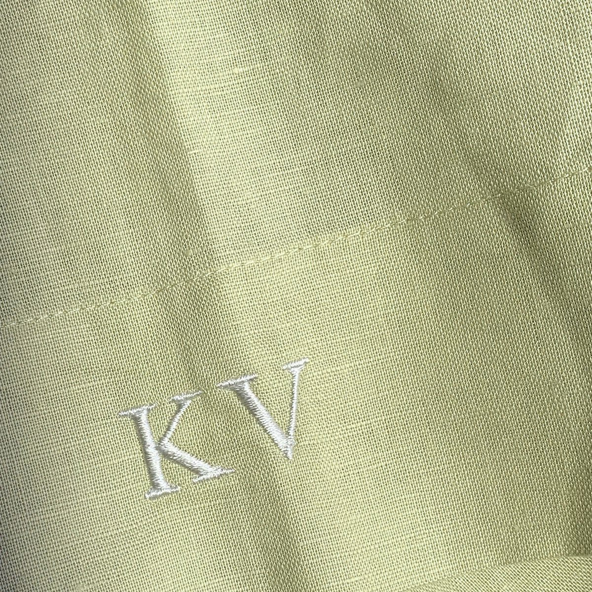 Embroidered initials on shirt