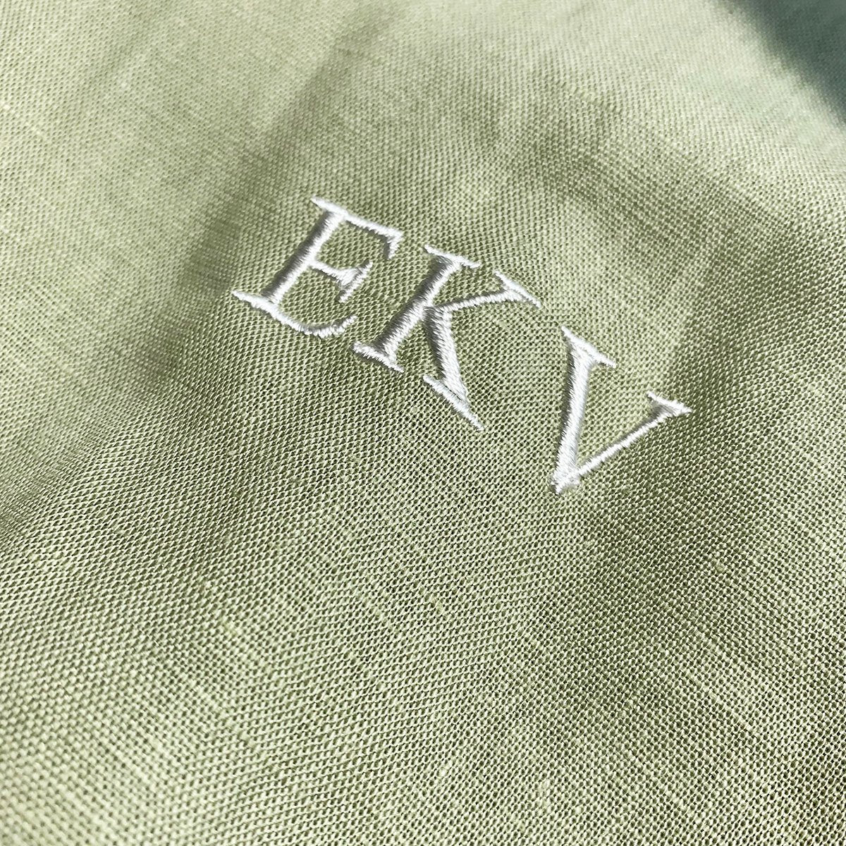 Embroidered initials on robe