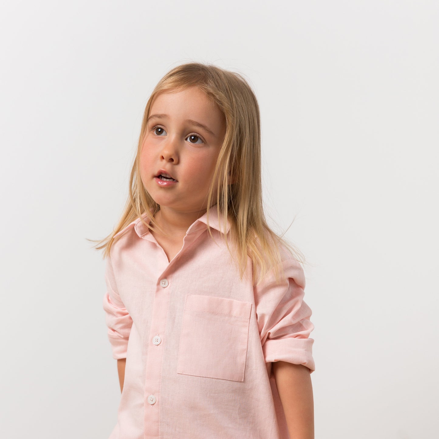 Girl wearing pink shirt dress