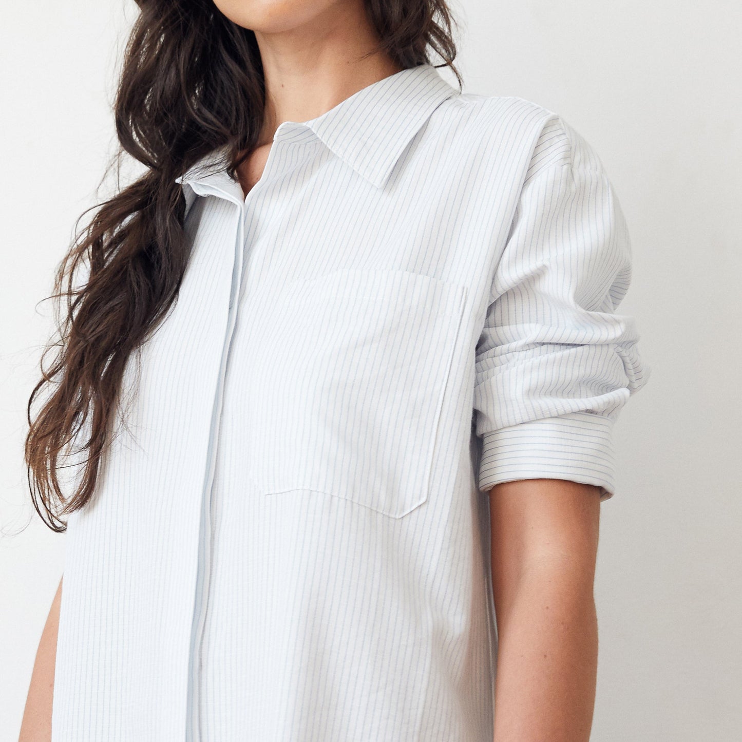 Close up view of woman wearing Mathilde Shirt Dress